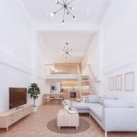 Rumah mezzanine modern dengan lantai tambahan untuk memaksimalkan ruang pada lahan terbatas.